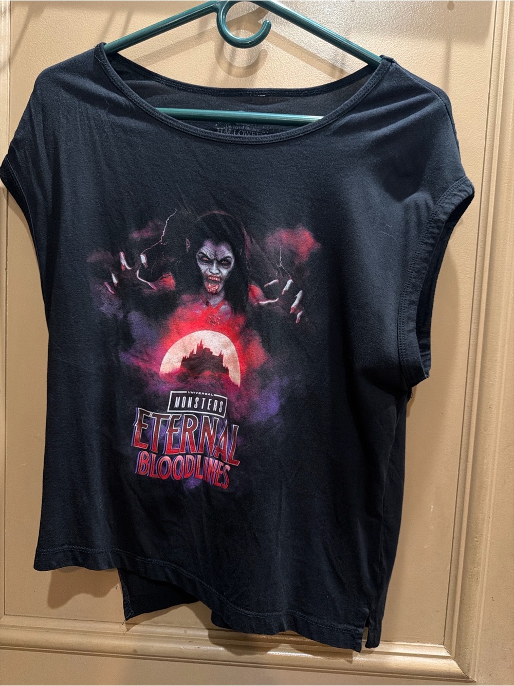 Universal Black Graphic Tee with Red & Purple Vampire Motif